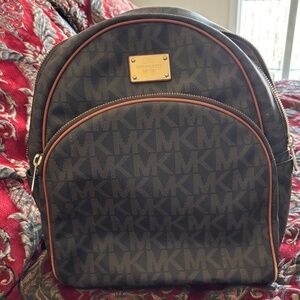 Micheal Kors Monogramed Backpack